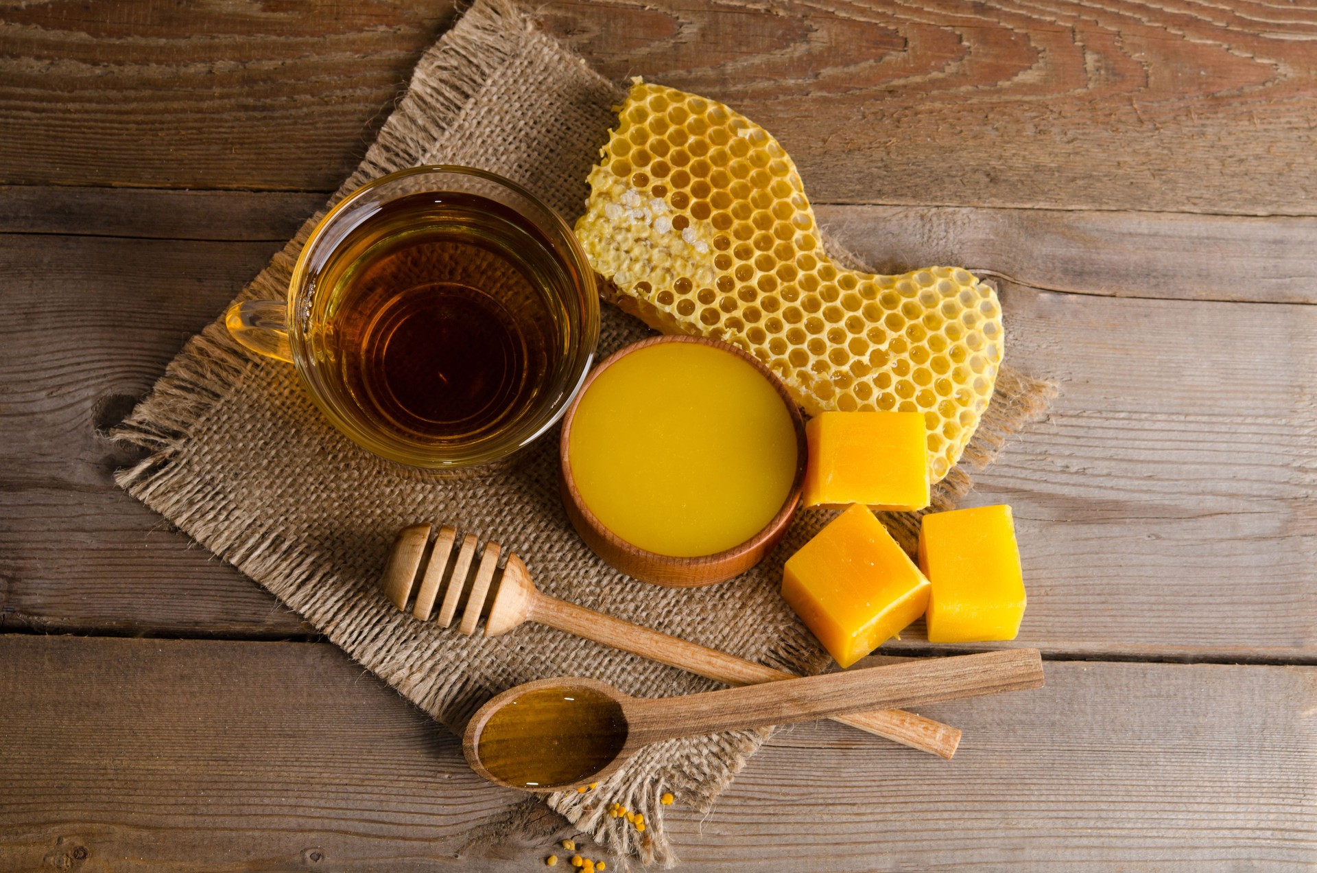 Still life from cup of tea, honey, wax and honeycombs